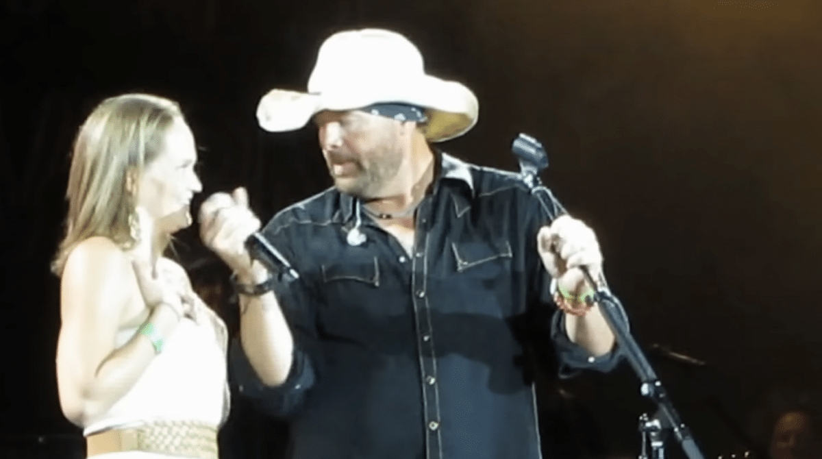 Toby Keith brings a soldier's wife on stage before her husband makes a surprise appearance.