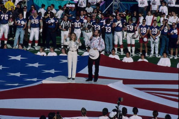 Garth Brooks sings the National Anthem before the Super Bowl in 1993