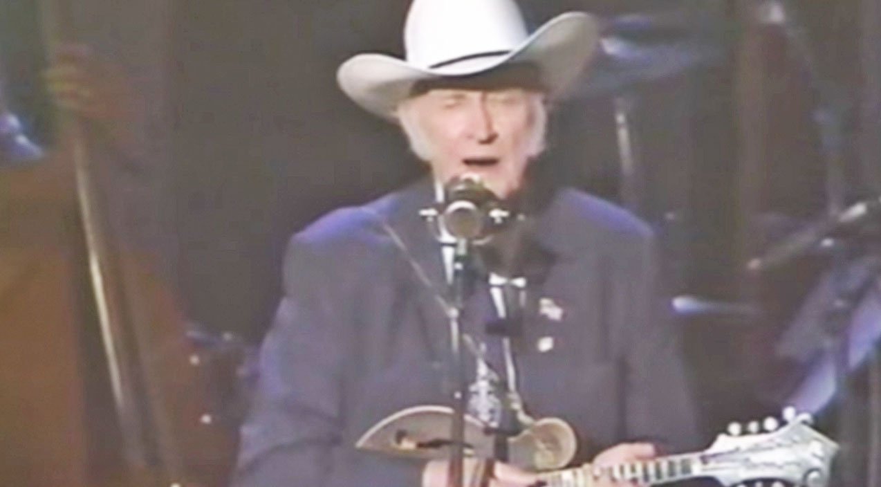 Photo of bill Monroe performing "Wayfaring Stranger"