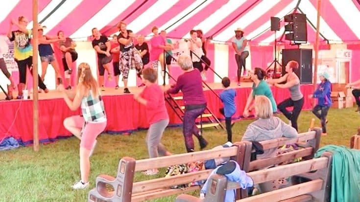 Workout Group Gets County Fair Goers Up & Moving With Line Dance To Trace’s Swingin’ Hit | Country Music Videos