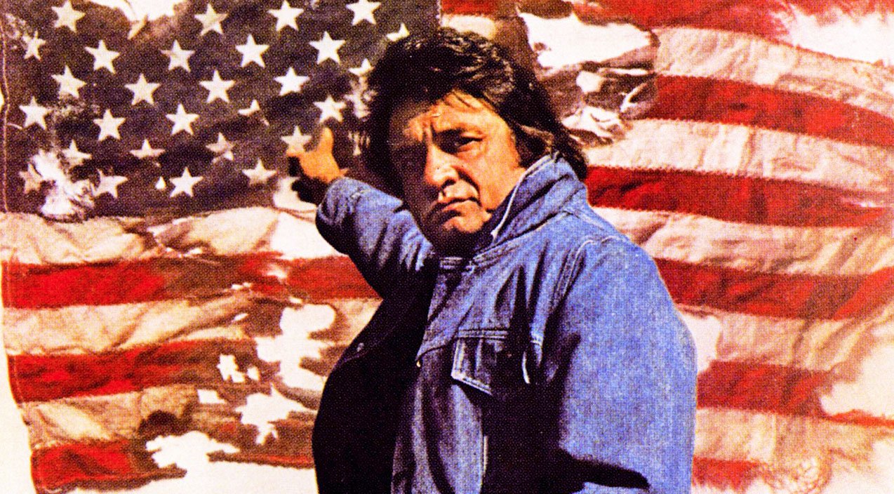 Johnny Cash Shows Patriotism And Respect For Old Glory In ‘Ragged Old Flag’ | Country Music Videos