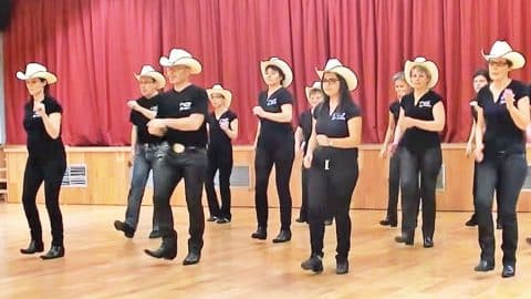 Line Dance Team Struts Their Stuff To Kenny Chesney Themed Routine | Country Music Videos