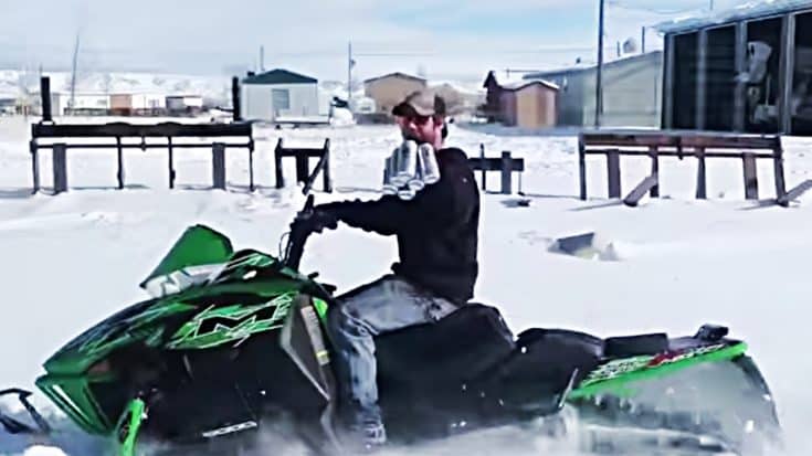 Snowed-In Man Heads For Beer On His Snowmobile | Country Music Videos