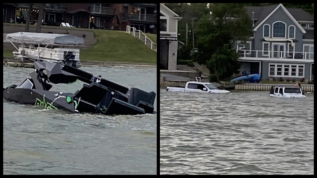 man partially submerges ford truck and jeep trying to