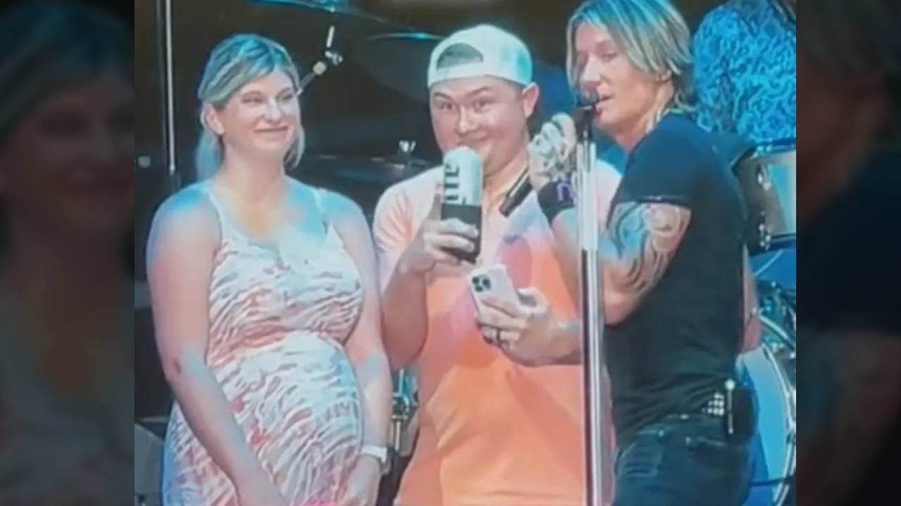 Keith Urban Helps Military Couple With Gender Reveal During Concert | Country Music Videos
