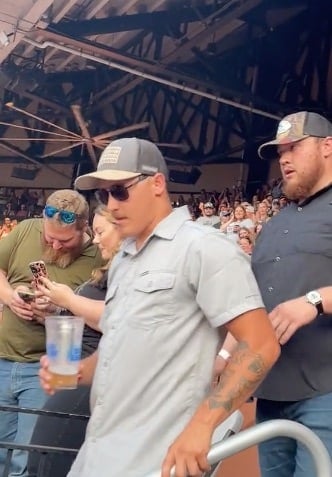 Still shot of the Luke Combs look-alike at his concert in St. Louis