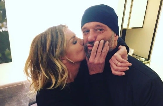 Faith Hill gives Tim McGraw a kiss on the cheek