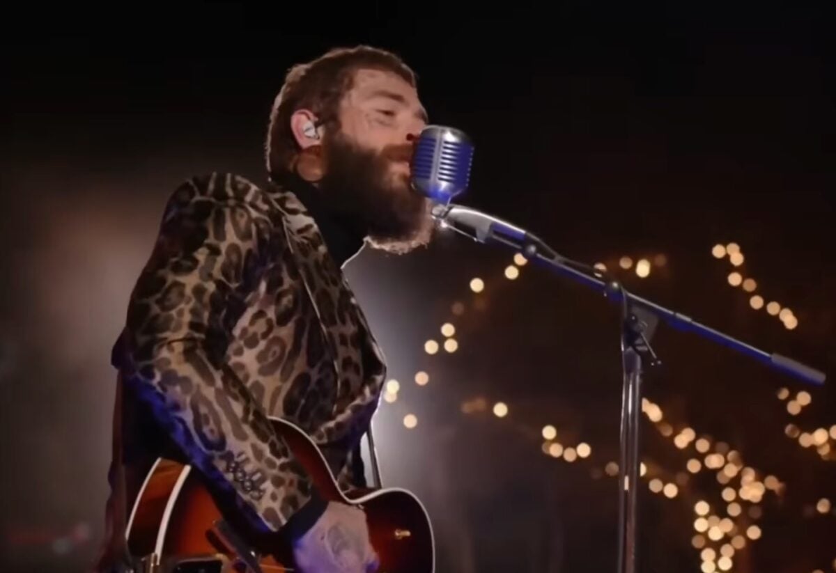 Post Malone performs before jumping in the pool at Graceland