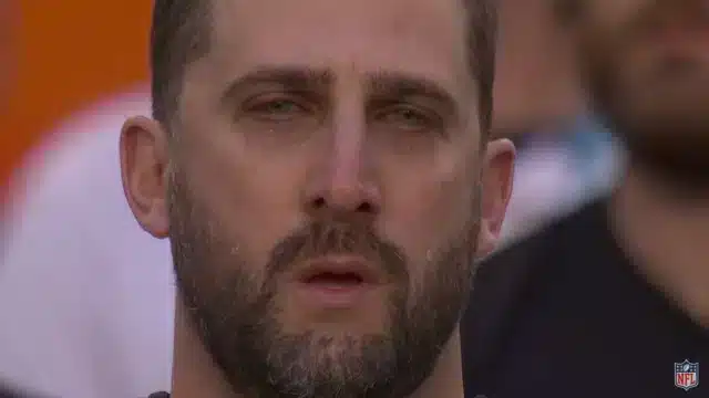Philadelphia Eagles Coach Nick Sirianni cries as Chris Stapleton sing the national anthem.