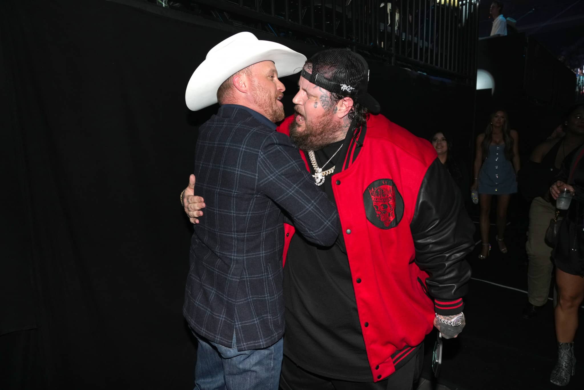 Cody Johnson hugs Jelly Roll to congratulate him on his Male Video of the Year win at the 2023 CMT Music Awards.
