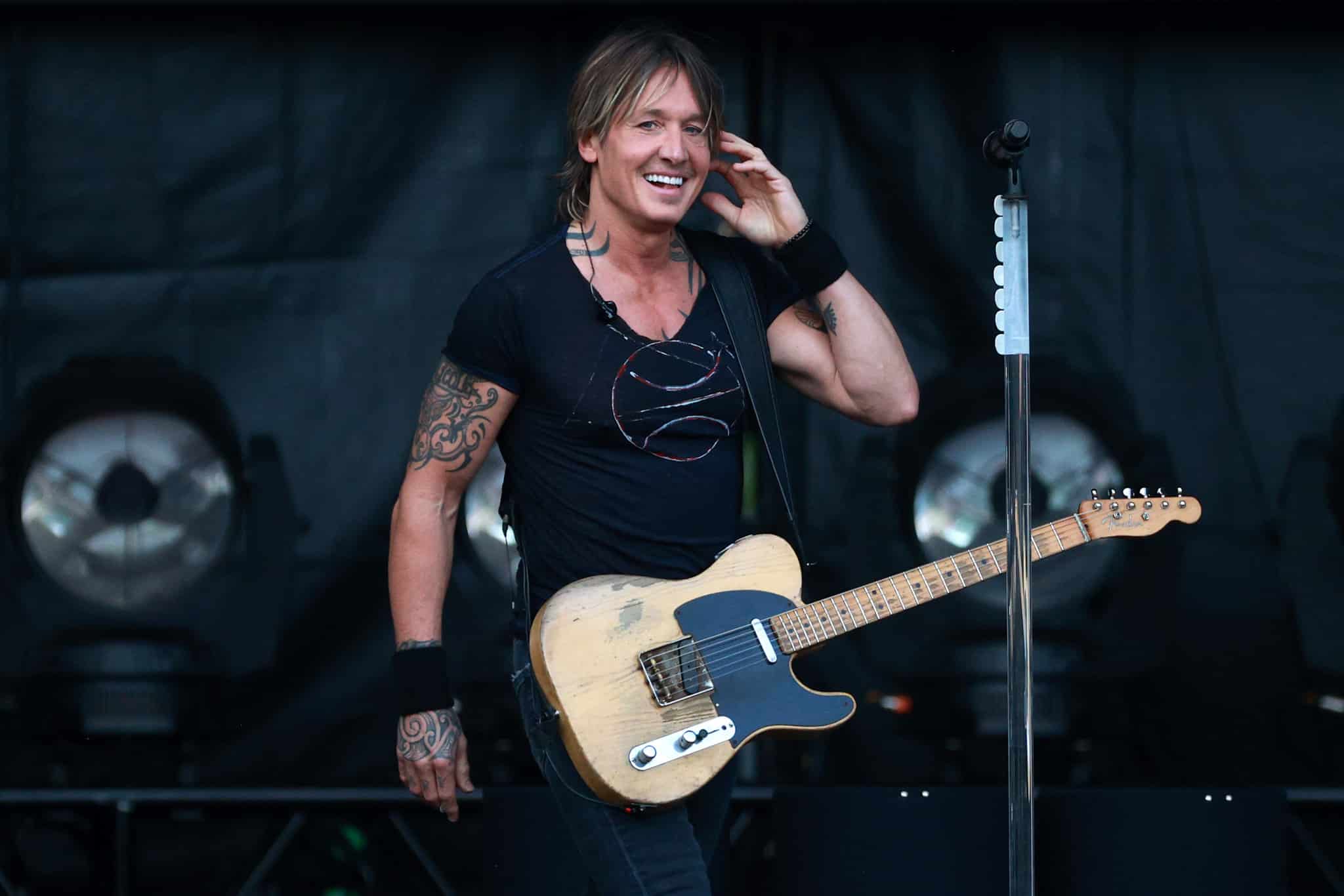 HOUSTON, TEXAS - APRIL 02: Keith Urban performs during the 2023 March Madness Music Festival at Discovery Green on April 2, 2023 in Houston, Texas. (Photo by Mike Lawrie/WireImage)