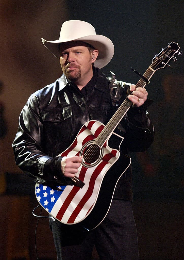 Toby Keith performs at the 29th American Music Awards January 9, 2002 at the Shrine Auditorium in Los Angeles. (Photo by M. Caulfield/WireImage)