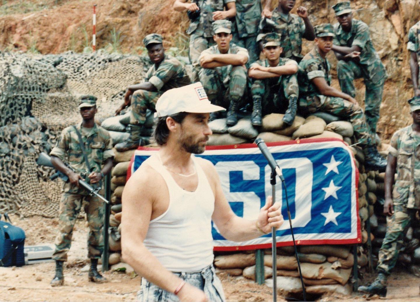 Preceding the invasion of Panama in 1989, President George Bush (41) asked me to fly there to raise the spirits of our troops about to go to war. We would perform in 4 separate locations in country. He also asked me to deliver a letter from him to 200 marines deep in the jungle. While in route we came under fire - my driver lost his index finger as we drove through the barrage of bullets. This picture was sent to me this week by Terry Cowan and it gives an idea of the conditions.I was honored to be called by the President of the United States to serve our military in lifting their spirits during such a tense time. 