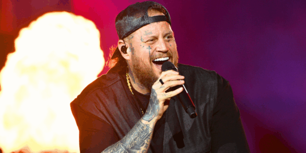 Listing fun facts about Jelly Roll's life and career, who's pictured here onstage in 2025