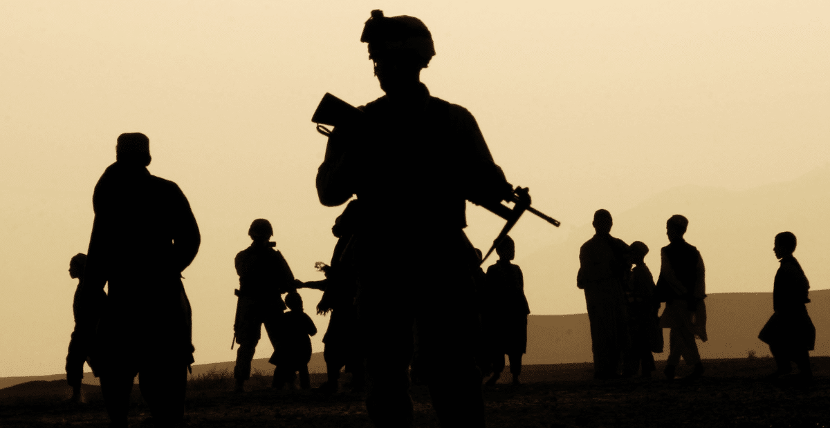 U.S. Soldiers Patrol And Build Relationships In Former Strong Hold Of The Taliban In Afghanistan A black shadow figure on a back drop