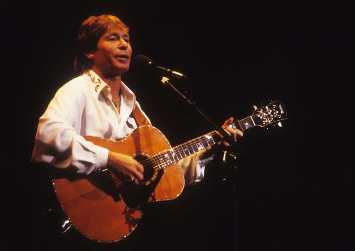 MINNEAPOLIS, MN - OCTOBER 5: John Denver performs at the Northrup Auditorium in Minneapolis, Minnesota on October 5, 1991.