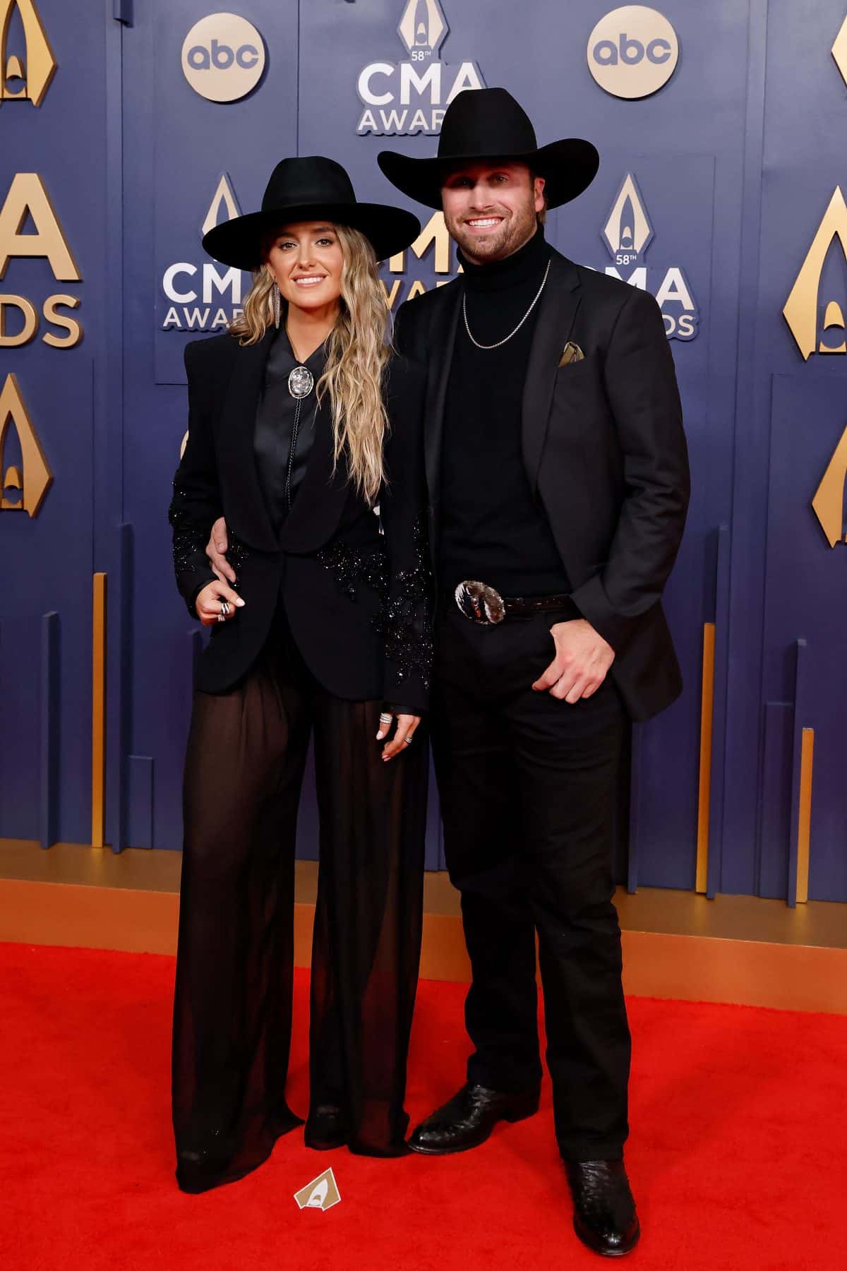 Lainey Wilson and Duck Hodges attend the 2024 CMA Awards at Music City Center on November 20, 2024 in Nashville, Tennessee. 