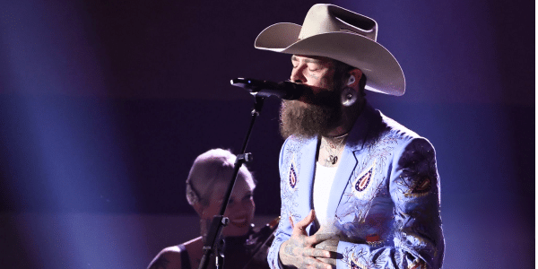 Post Malone performing at the 58th Annual CMA Awards