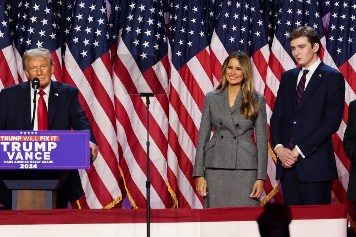 Donald Trump and his wife Melania Trump with their son Barron Trump during an election night event at the Palm Beach Convention Center in West Palm Beach, Florida.