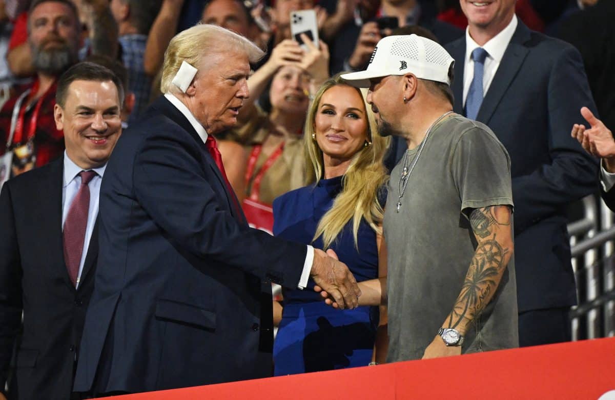 Donald Trump shakes hands with US singer Jason Aldean on the last day of the 2024 Republican National Convention 