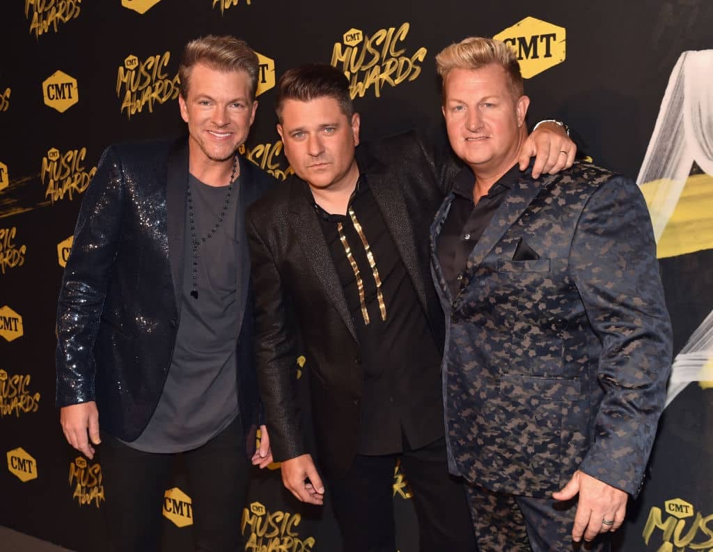 Joe Don Rooney, Jay DeMarcus and Gary LeVox of musical group Rascal Flatts attend the 2018 CMT Music Awards at Nashville Municipal Auditorium on June 6, 2018 in Nashville, Tennessee.