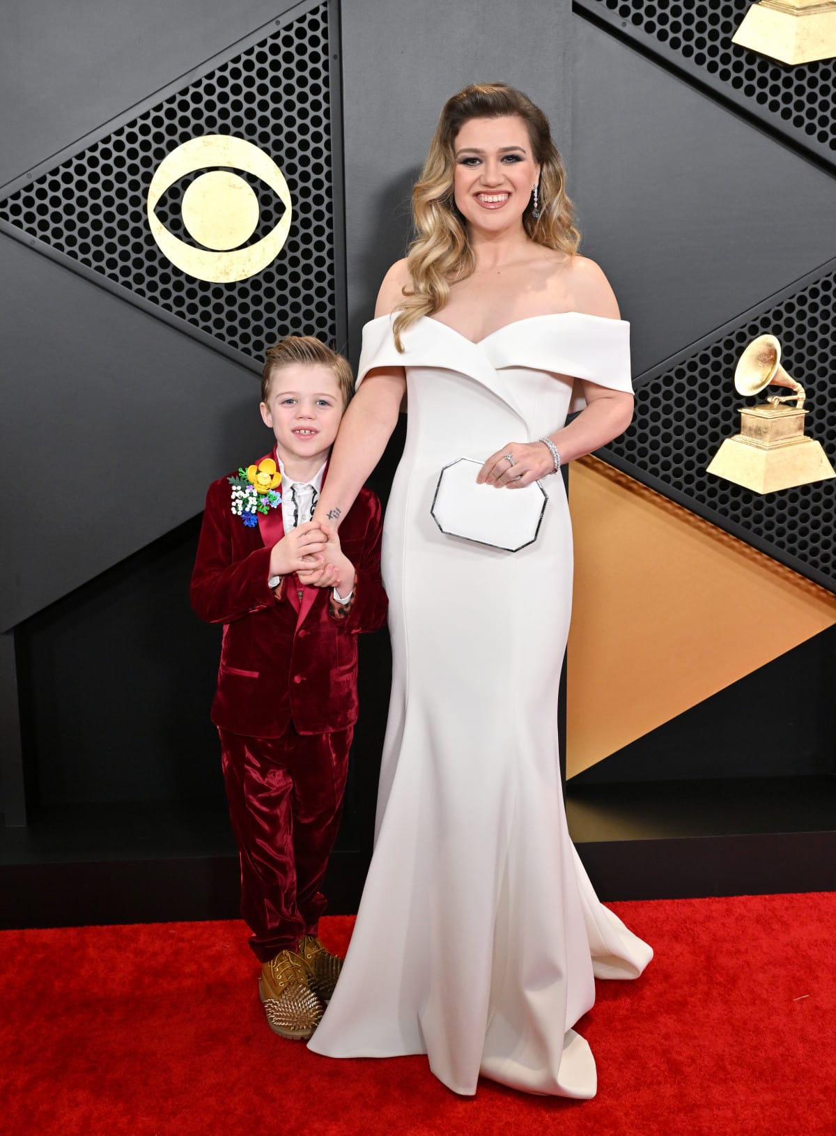 Remington Alexander and Kelly Clarkson attend the 66th GRAMMY Awards in 2024