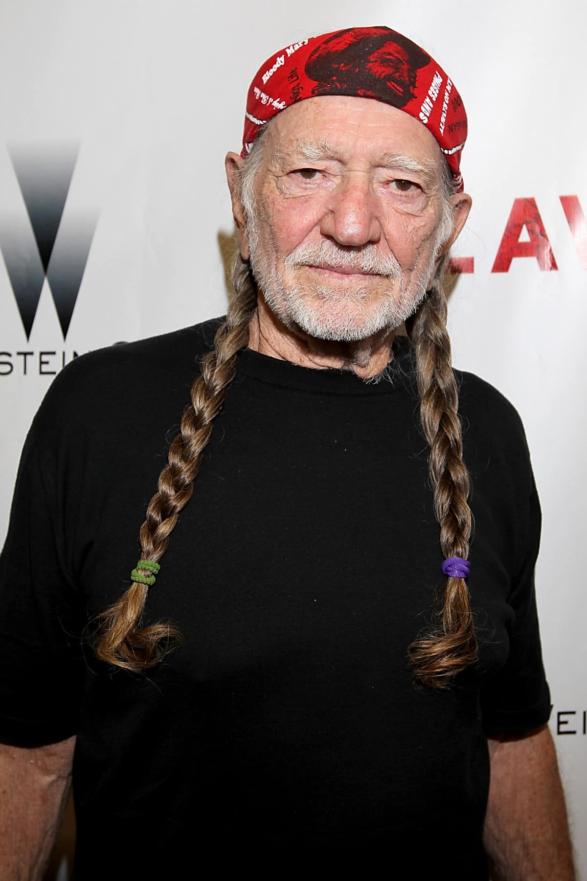 Musician Willie Nelson walks the red carpet for the new film Lawless at the Alamo Drafthouse on August 25, 2012 in Austin, Texas