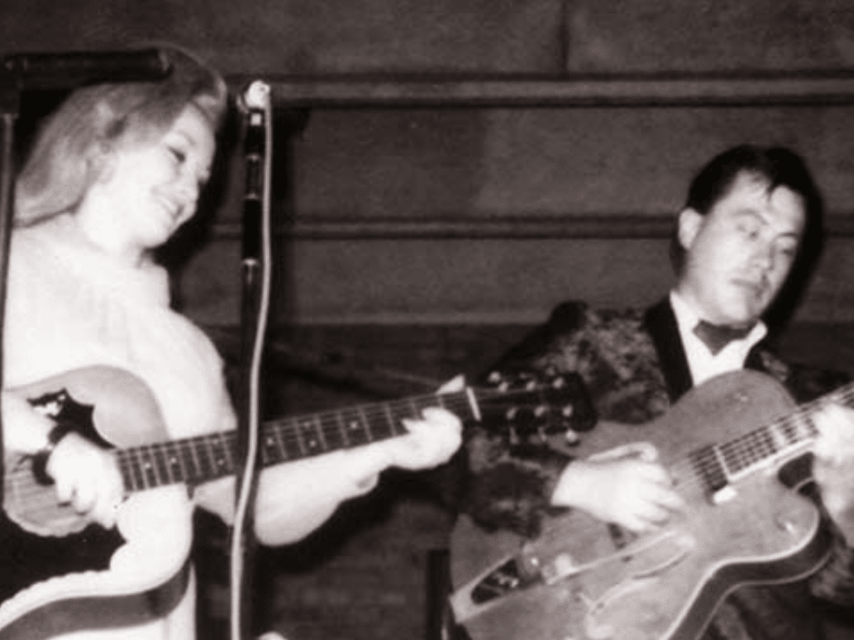 Dolly Parton joins her uncle Bill Owens for a performance at the Grand Ole Opry.