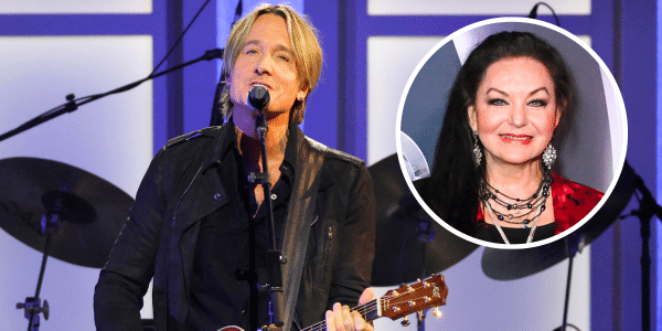 Keith Urban honors Crystal Gayle during the Opry 100 TV special.