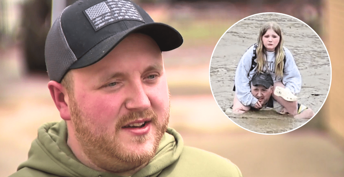 Father saves daughter in rising floodwaters.