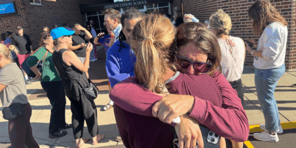 In the morning of August 27, a shooting was reported at Annunciation Catholic School in Minneapolis, Minnesota. Here, parents can be seen waiting to hear from their children. (Richard Tsong-Taatarii / The Minnesota Star Tribune via Getty Images)