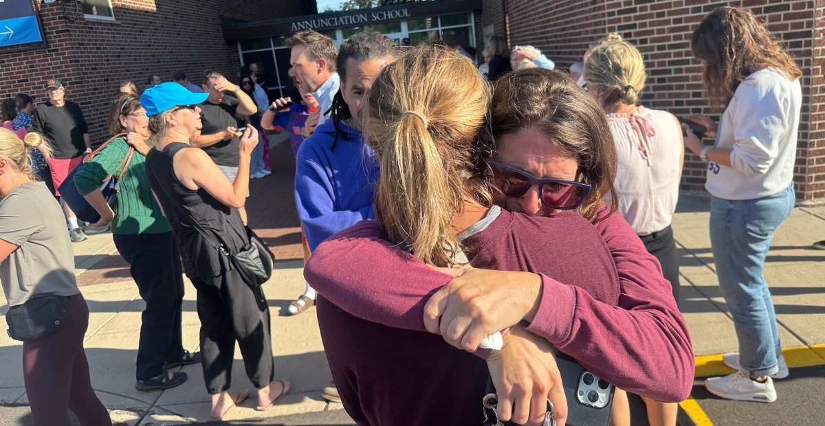 In the morning of August 27, a shooting was reported at Annunciation Catholic School in Minneapolis, Minnesota. Here, parents can be seen waiting to hear from their children. (Richard Tsong-Taatarii / The Minnesota Star Tribune via Getty Images)
