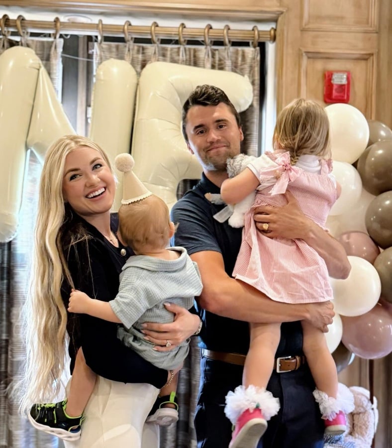 Erika and Charlie Kirk with their two children 