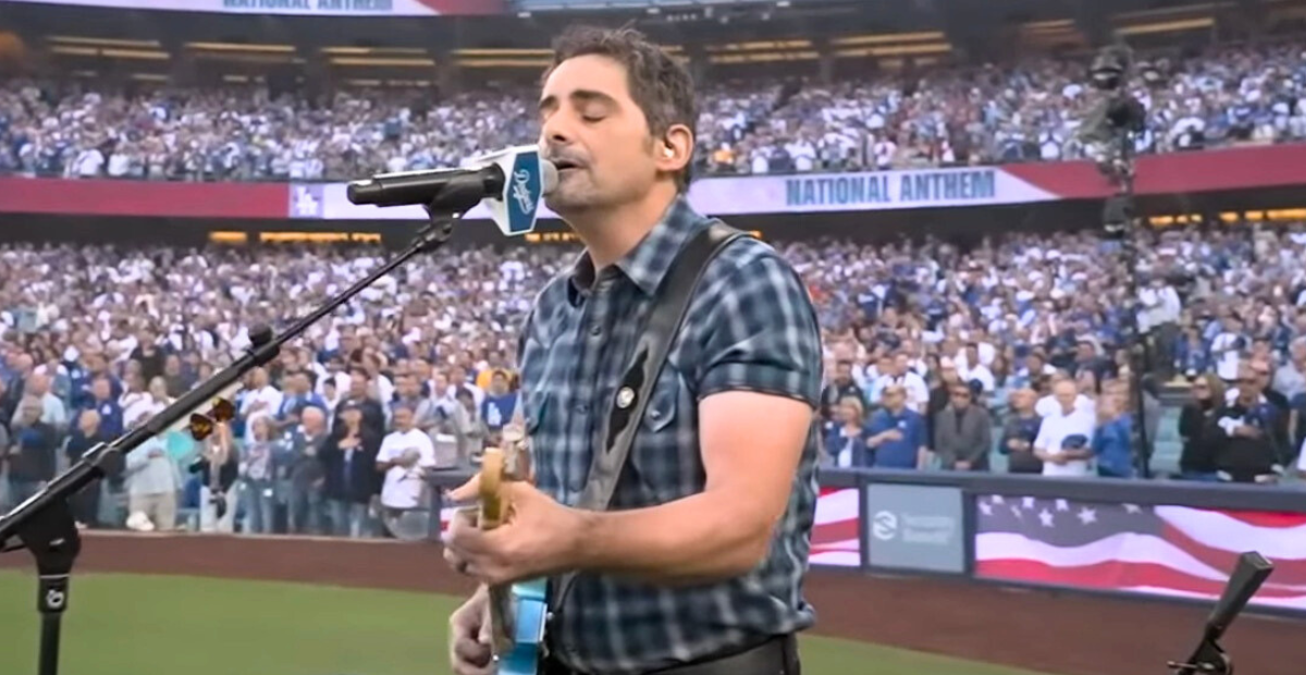 Brad Paisley performs the national anthem before Game 3 of the 2025 World Series
