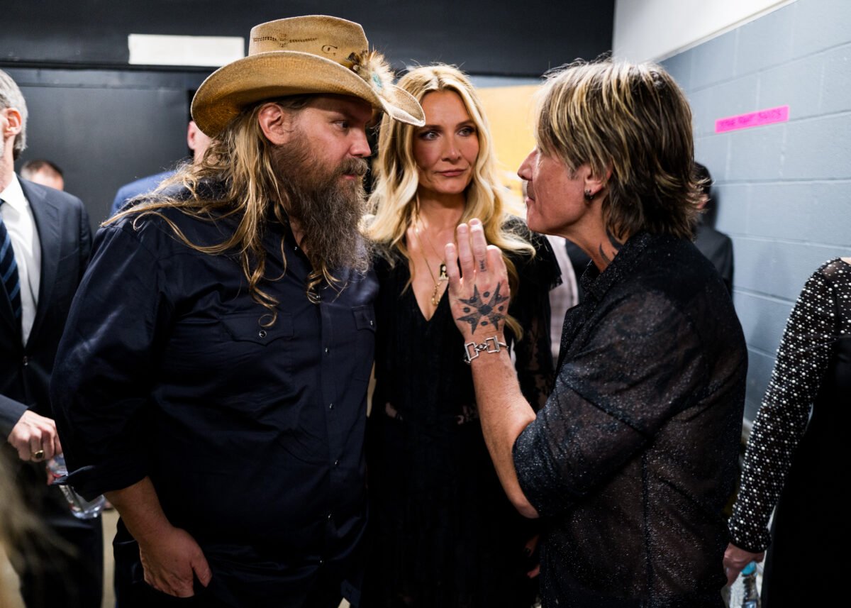 Chris and Morgan Stapleton visit with Keith Urban backstage