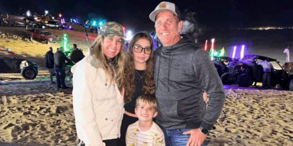Cristina Biffle, Emma Biffle, Greg Biffle, and Ryder Biffle on the beach