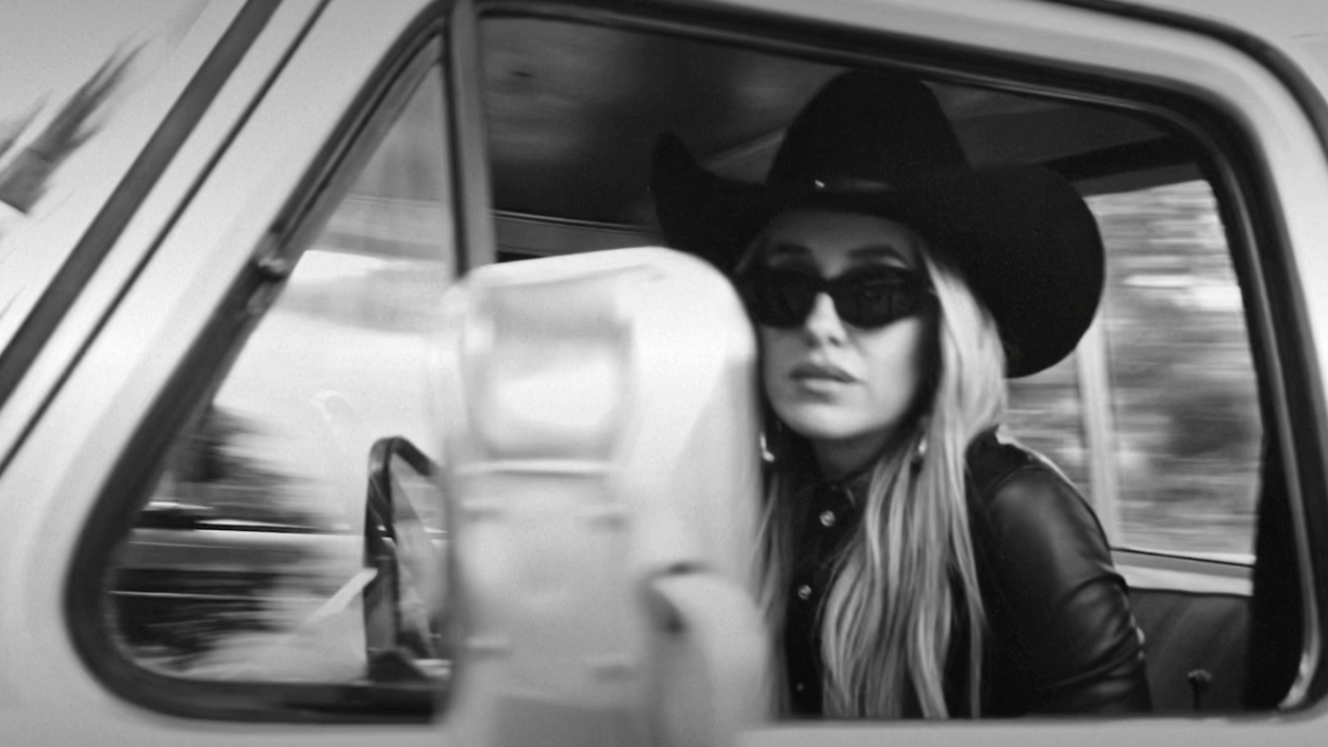 lainey wilson in a truck