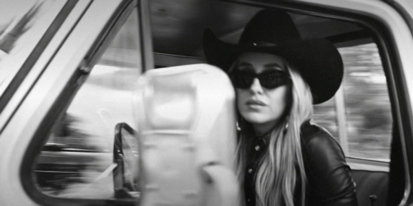 lainey wilson in a truck