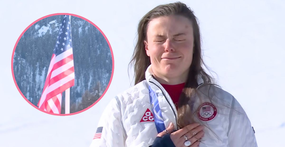 Breezy Johnson had an emotional reaction to hearing the National Anthem after her gold medal win at the Olympics