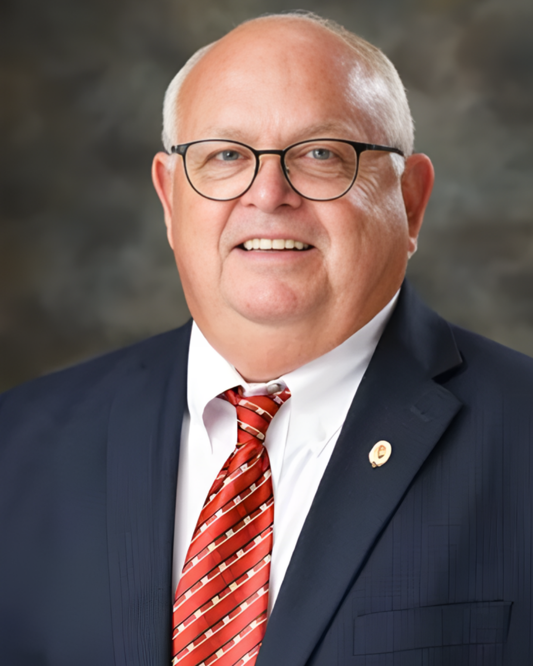 principal kirk moore posing for a portrait