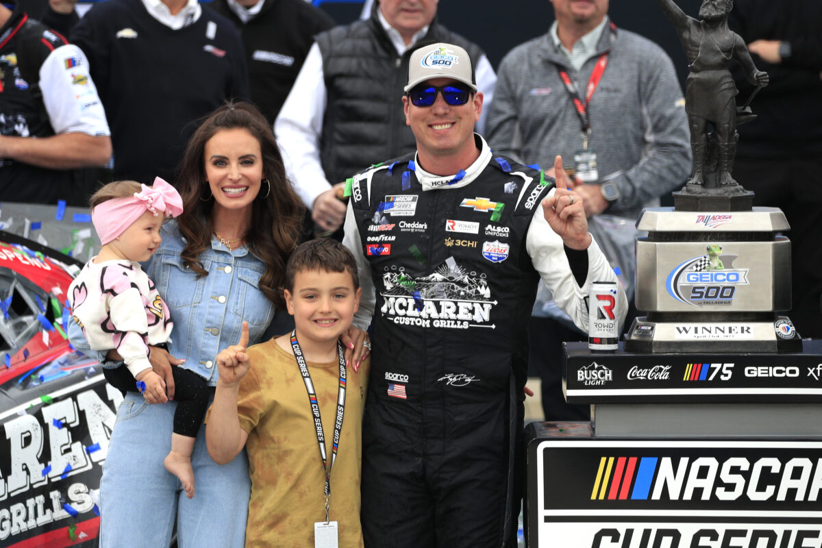 Kyle Busch, his wife Samantha Busch, their son Brexton, and daughter Lennix after winning the NASCAR Cup Series GEICO 500 on April 23, 2023 at Talladega SuperSpeedway