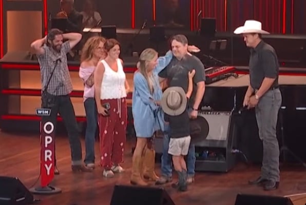 Rhett Akins is joined by his family after being invited to the Grand Ole Opry 