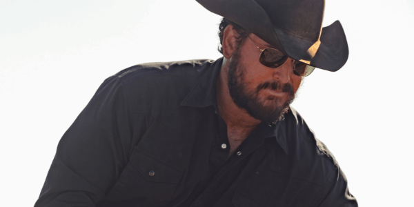 Cole Hauser in character as Rip Wheeler in a scene from Dutton Ranch, he explains why he was sweating it out on set
