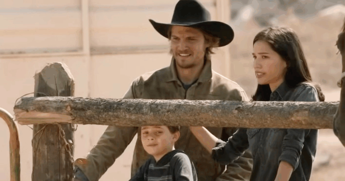 Luke Grimes as Kayce Dutton, Brecken Merrill as Tate, and Kelsey Asbille as Monica in a scene from Yellowstone