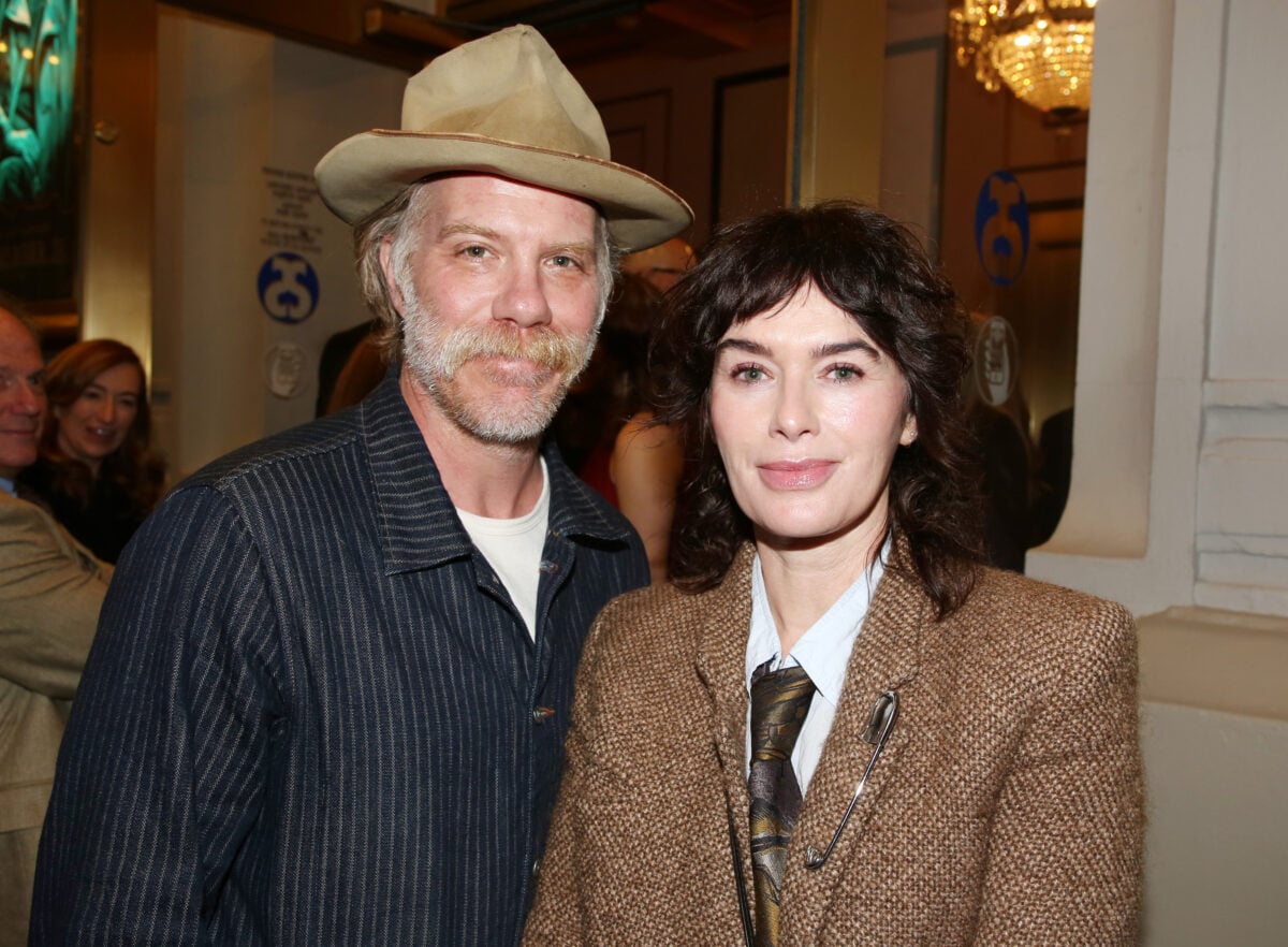 NEW YORK, NEW YORK - NOVEMBER 19: Marc Menchaca and Lena Headey pose at the opening night of the new Avett Brothers musical "Swept Away" on Broadway at The Longacre Theatre on November 19, 2024 in New York City.