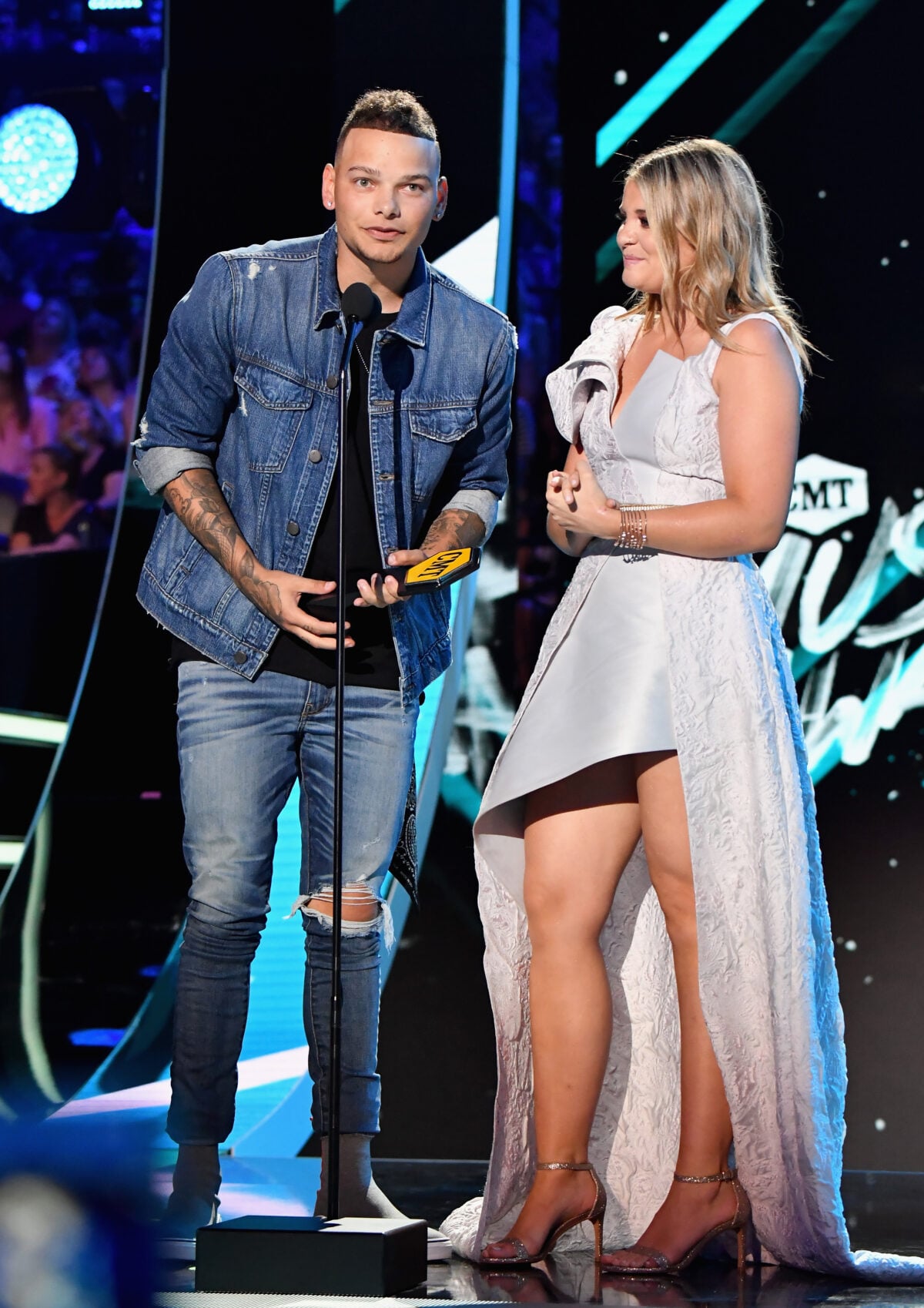 NASHVILLE, TN - JUNE 06: Kane Brown and Lauren Alaina accept an award at the 2018 CMT Music Awards at Bridgestone Arena on June 6, 2018 in Nashville, Tennessee.