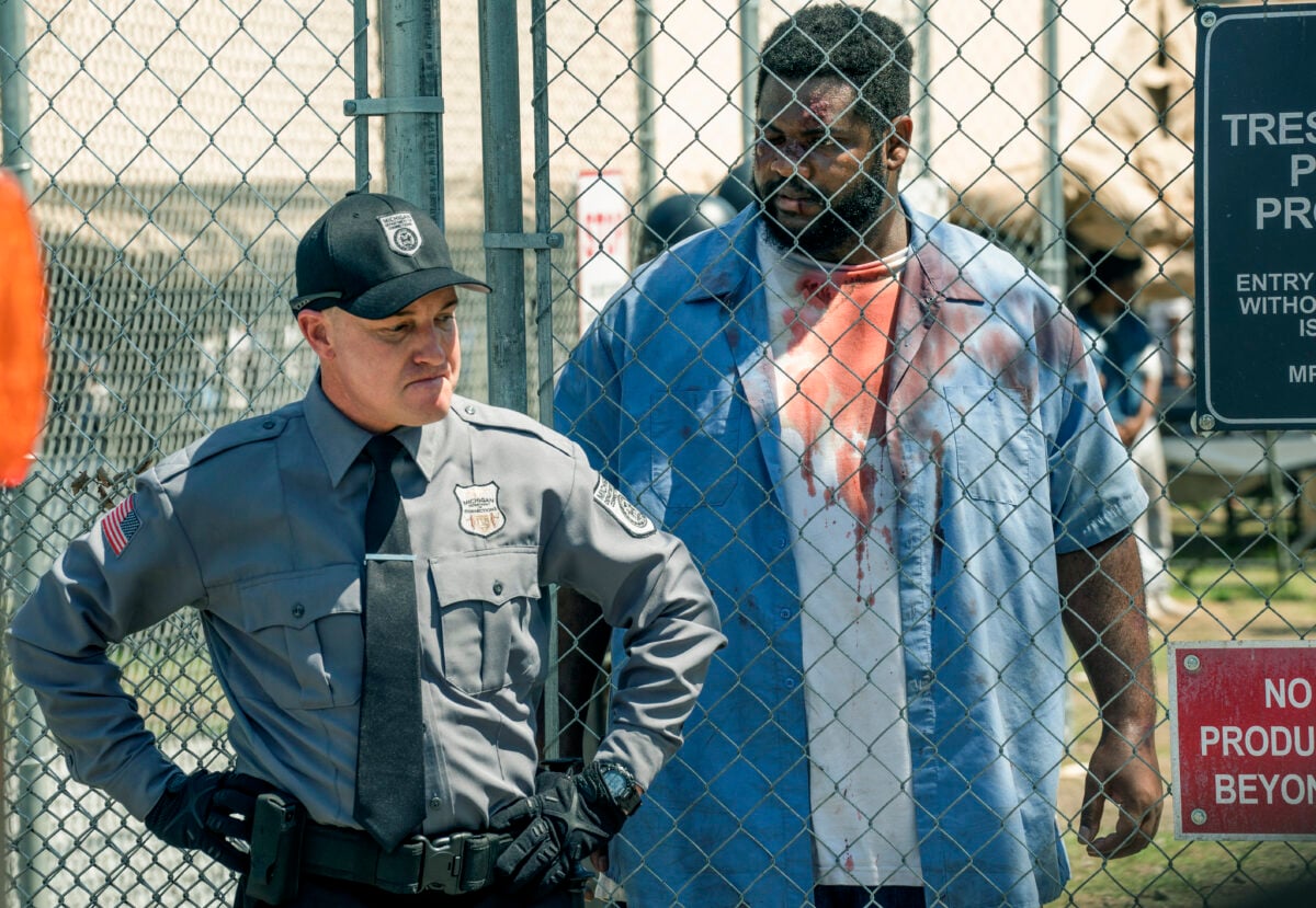 MAYOR OF KINGSTOWN - “The Pool”- Lane Garrison as Carney and Tobi Bamtefa as Deverin “Bunny” Washington in season 2, episode 4 of the Paramount + series MAYOR OF KINGSTOWN. Photo Cr: Dennis P. Mong Jr./Paramount +. © 2022 Viacom International Inc. All Rights Reserved.