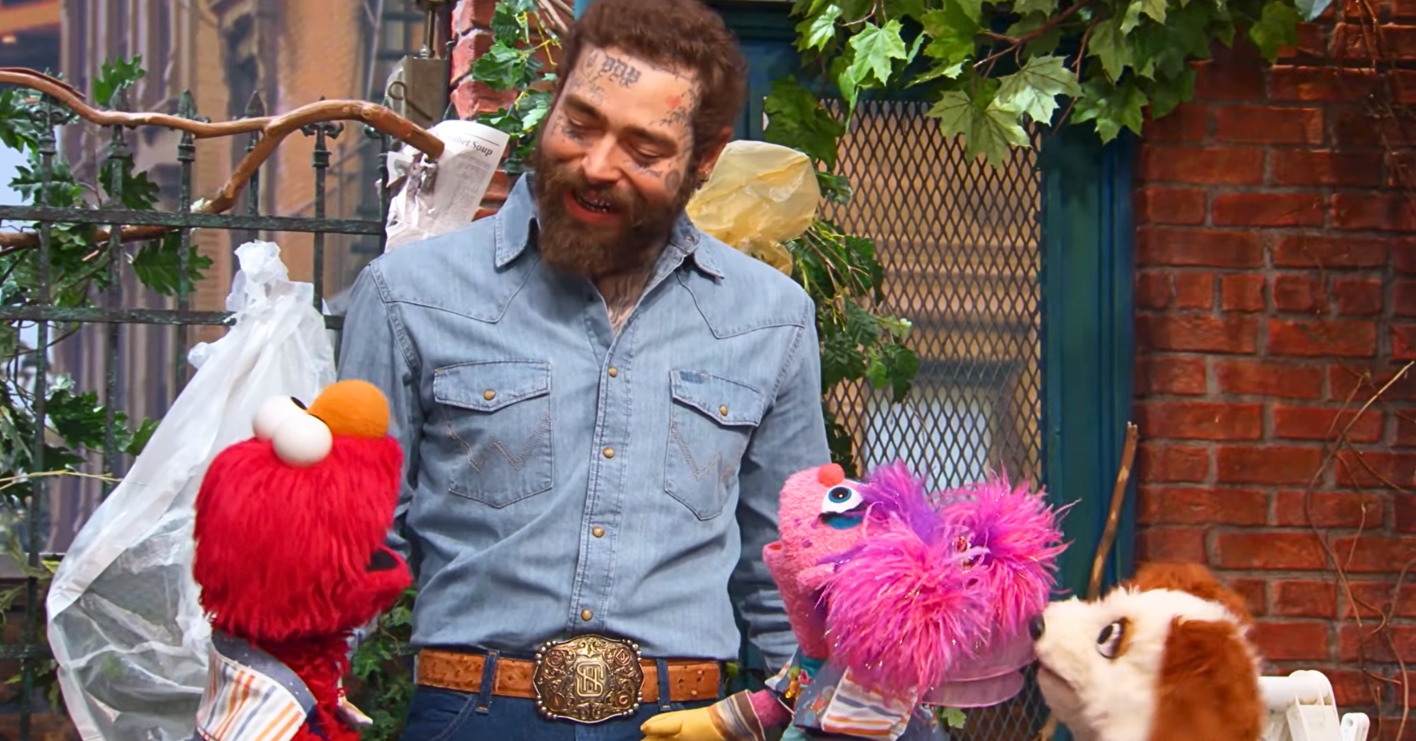 In an upcoming "Sesame Street" special, Post Malone sings with Elmo about the good that "a little help" can bring a community...