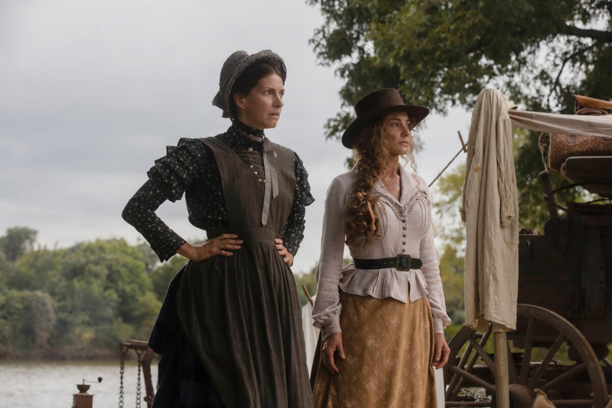 Pictured: Anna Fiamora as Risa and Faith Hill as Margaret of the Paramount+ original series 1883. Photo Cr: Emerson Miller/Paramount+ © 2021 MTV Entertainment Studios. All Rights Reserved.