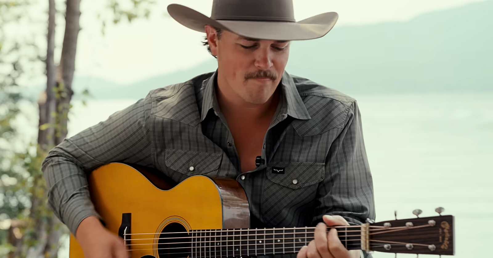 Country artist Zach Top has new music on the horizon, and he's helping fans quench their thirst by releasing a video of himself performing his next single on an acoustic guitar.